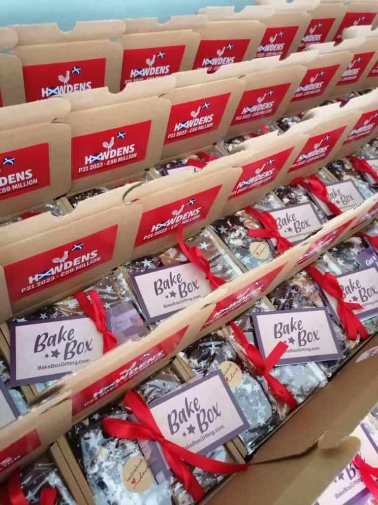 BakeBox Letterbox Gifts branded with Howdens logo and personal message for corporate event to show employee appreciation at Haggs Castle